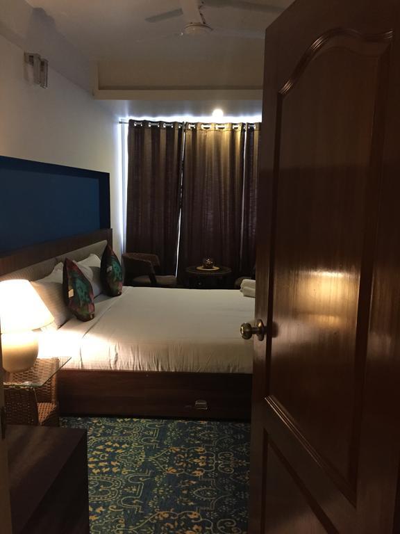 Luxtay Suites Bangalore Room photo